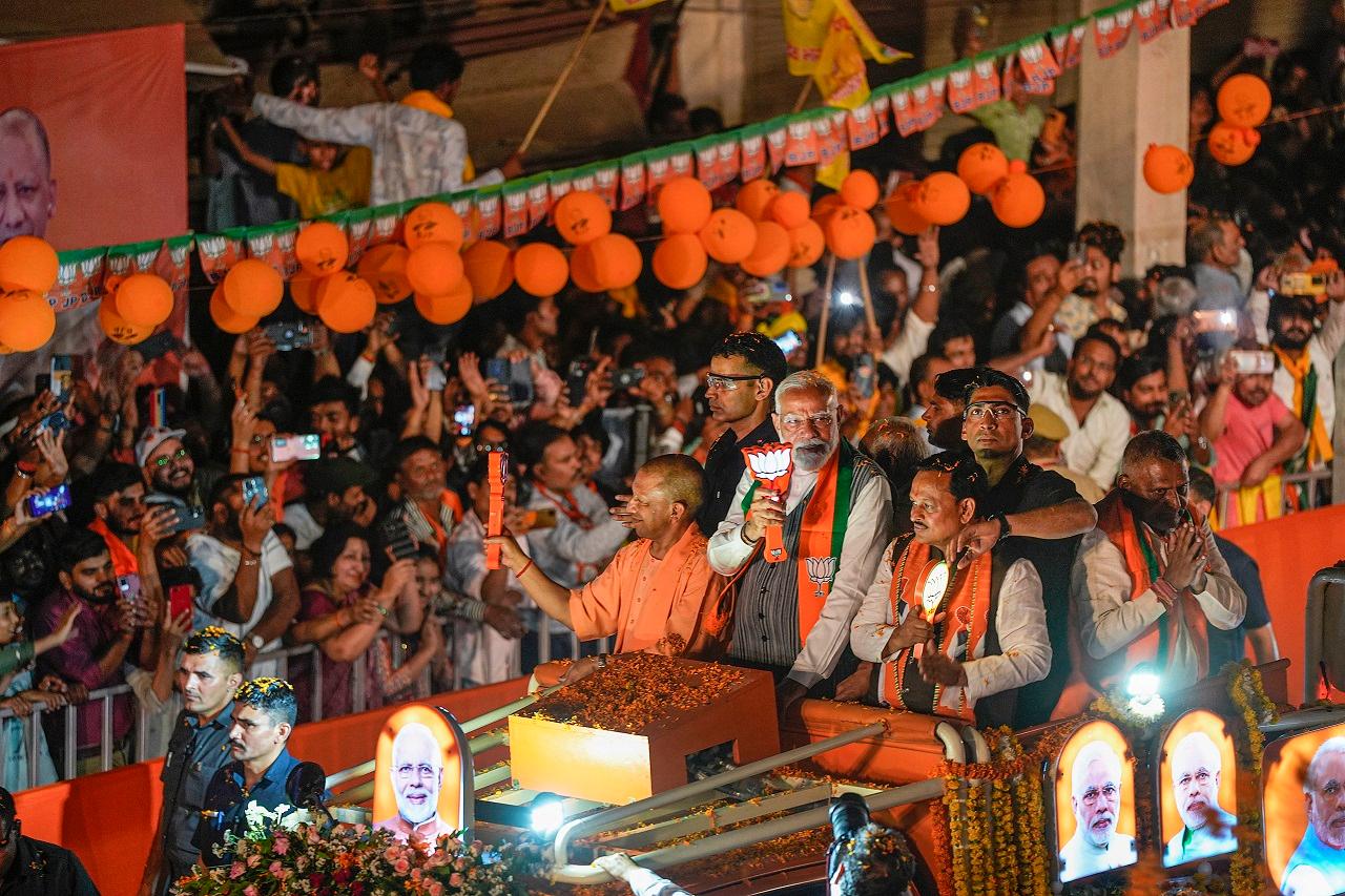 The prime minister was accompanied by Uttar Pradesh Chief Minister Yogi Adityanath, the BJP's Kanpur candidate Ramesh Awasthi and Akbarpur candidate Devendra Singh atop the open-hooded vehicle