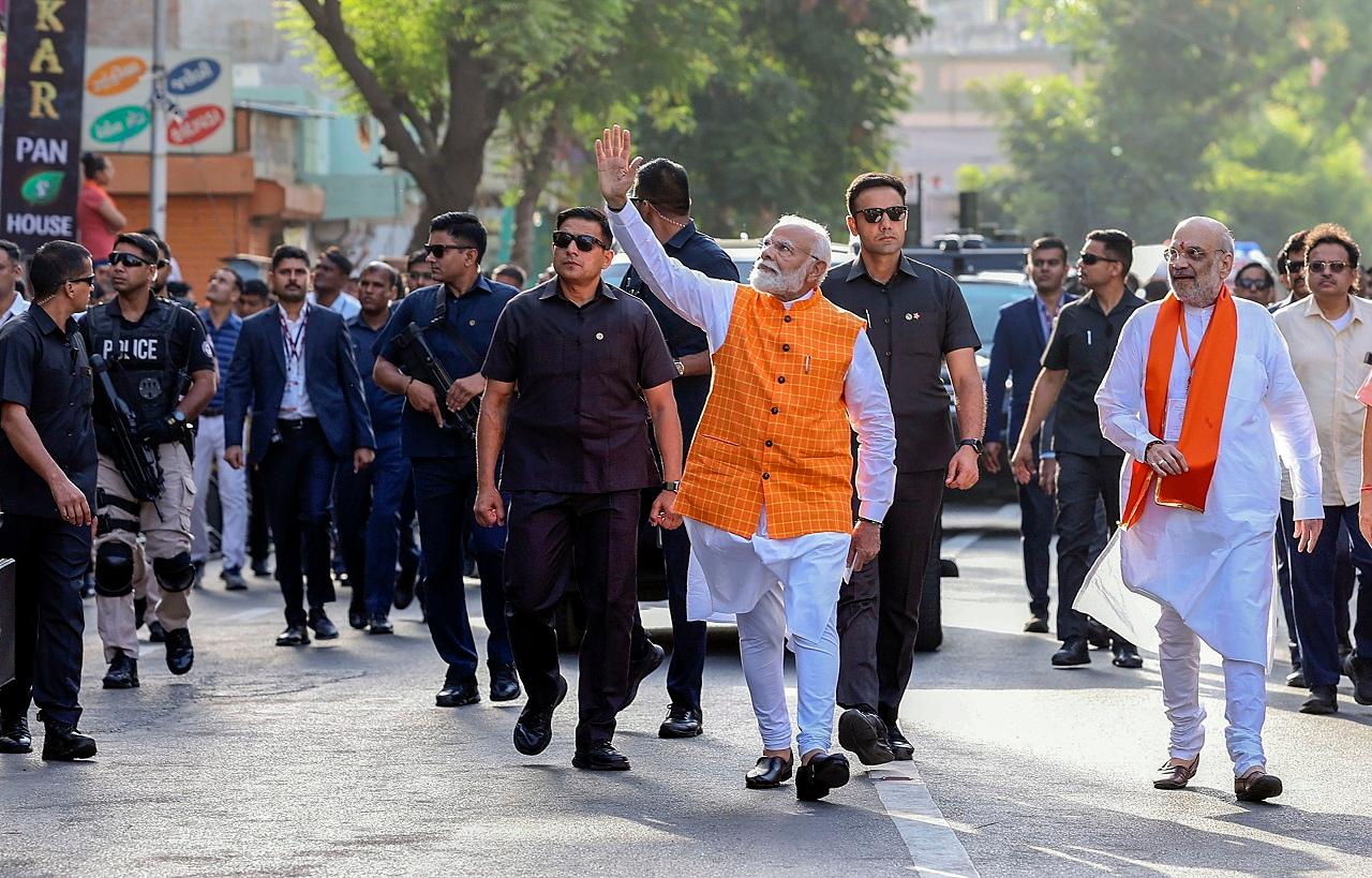 The PM, who arrived in Ahmedabad on Monday night, cast his vote in the polling booth after getting his finger inked