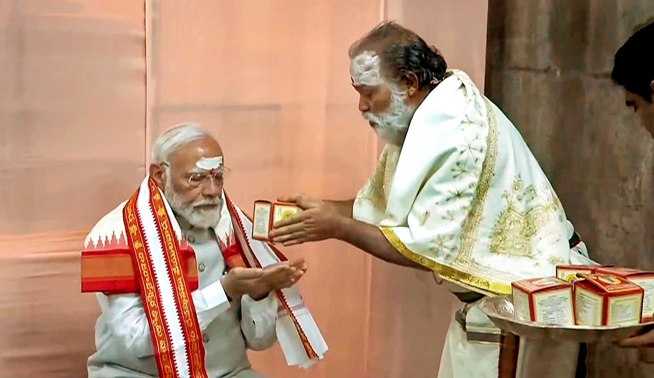 The temple priests applied tilak on PM Modi's forehead and gave Vedic blessings