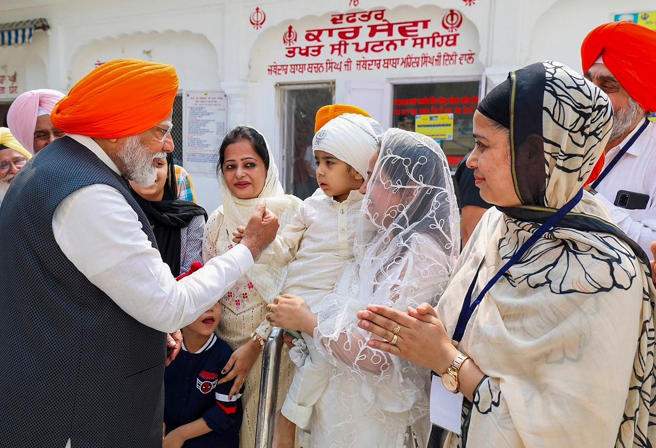 The entire road stretch was decked up with saffron hues as BJP flags were seen on either side of the road, and thousands of party workers and supporters too were wearing saffron shawls and caps