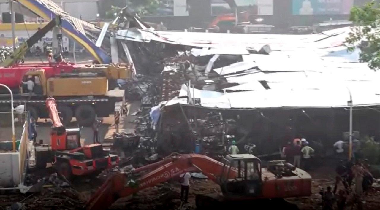 The 100-foot-tall illegal billboard fell at a petrol pump in Ghatkopar during dust storms and unseasonal rains that lashed Mumbai on Monday