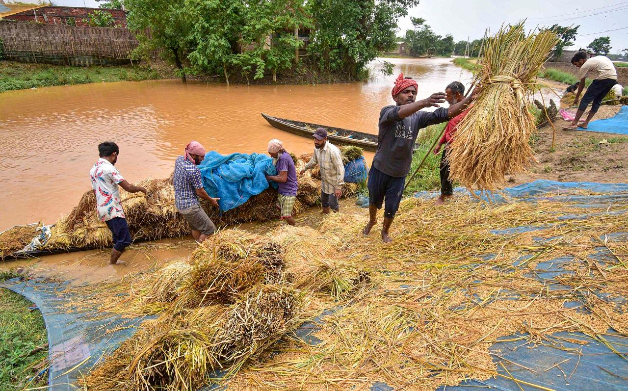 In Karimganj district, the flood waters submerged 66 villages and washed away portions of five embankments