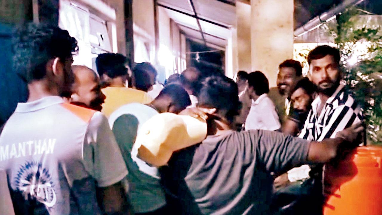 A large number of people at a polling centre in Palghar late on Monday