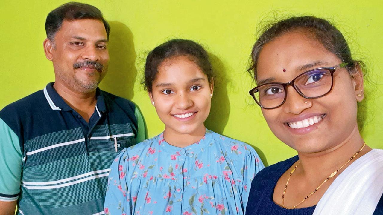 Purva Shirke with her parents