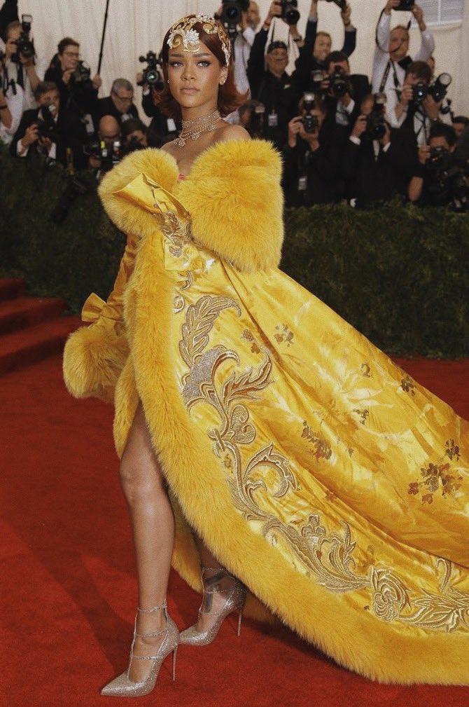 Rihanna stole the show at the 2015 Met Gala in a stunning yellow dress by Chinese designer Guo Pei. (Pic/Fenty Cop)