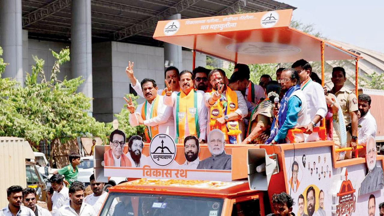 BJP leaders Ganesh and Sanjeev Naik at the campaign rally of Sena’s Thane candidate Naresh Mhaske in Navi Mumbai on Thursday