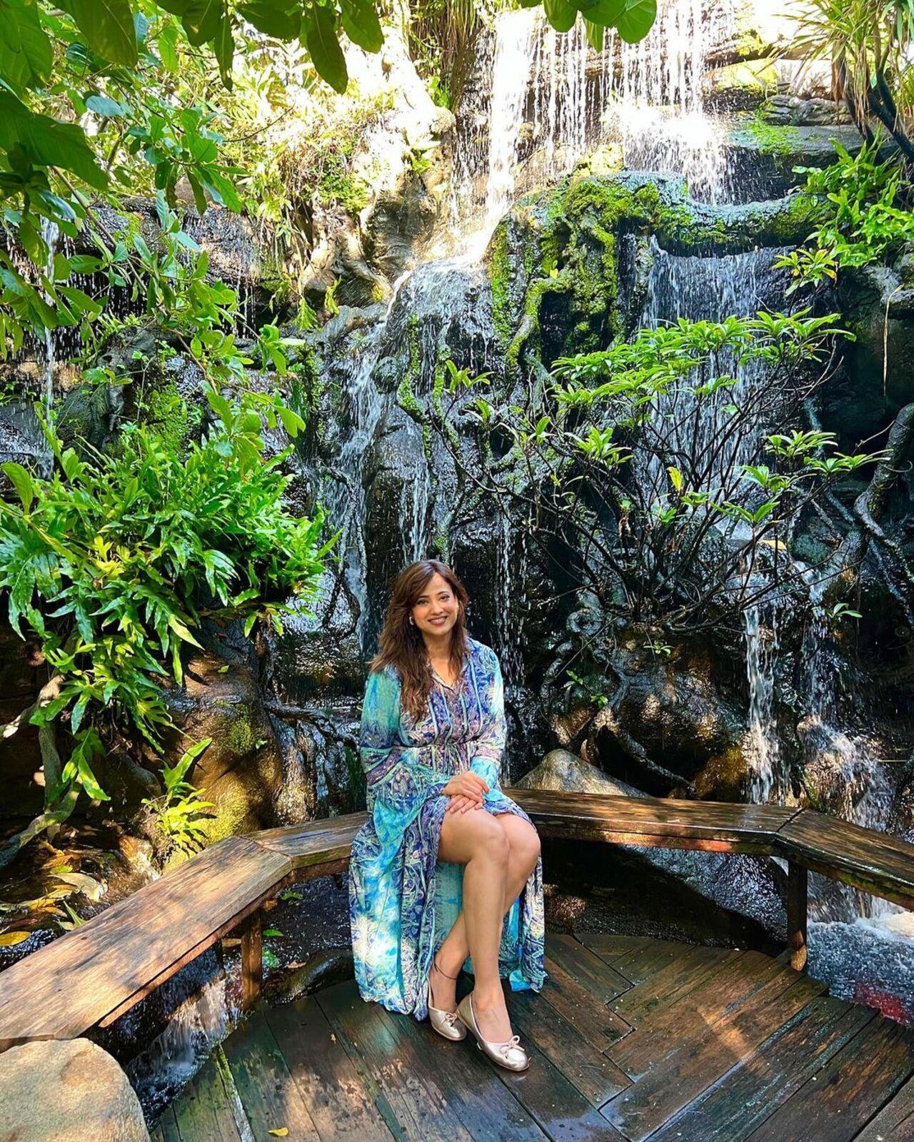 On the same day, she sat near a waterfall, a great way to secure some nature therapy. 