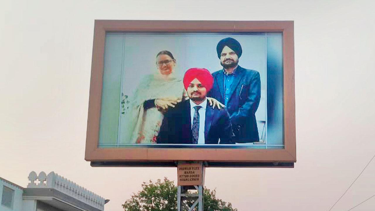 A billboard of Sidhu Moosewala in his hometown, Moosa