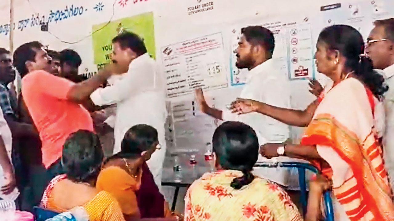 YSRCP leader A Sivakumar and a voter clash during voting. Pic/PTI