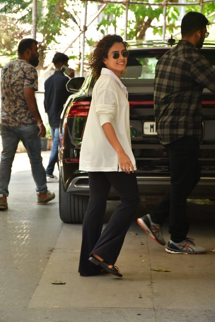 Sanya Malhotra looked uber cool in loose shirt and wide-legged pants as she was clicked in the city