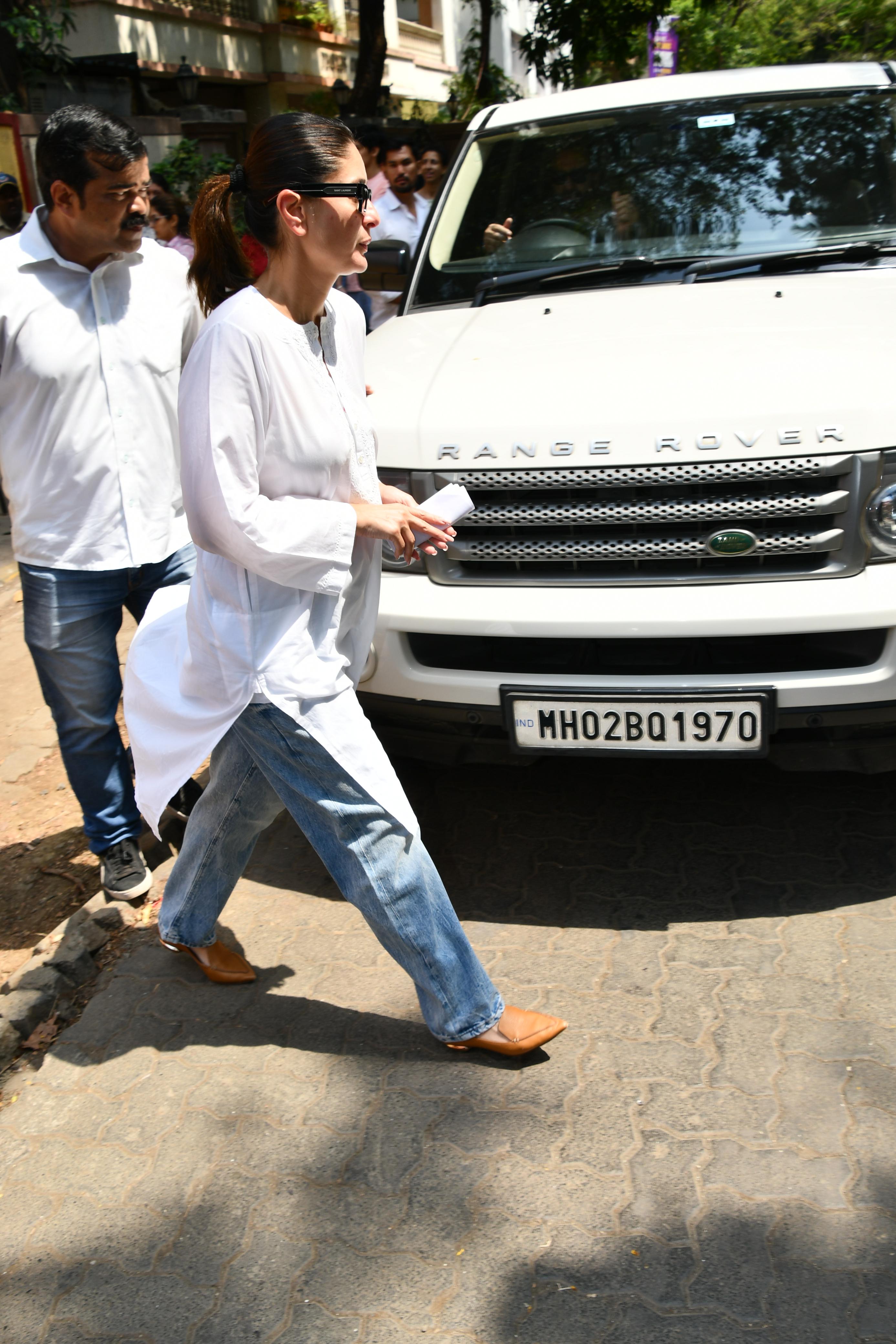 Kareena Kapoor was clicked in a white kurta and blue jeans as she went to exercise her right to vote