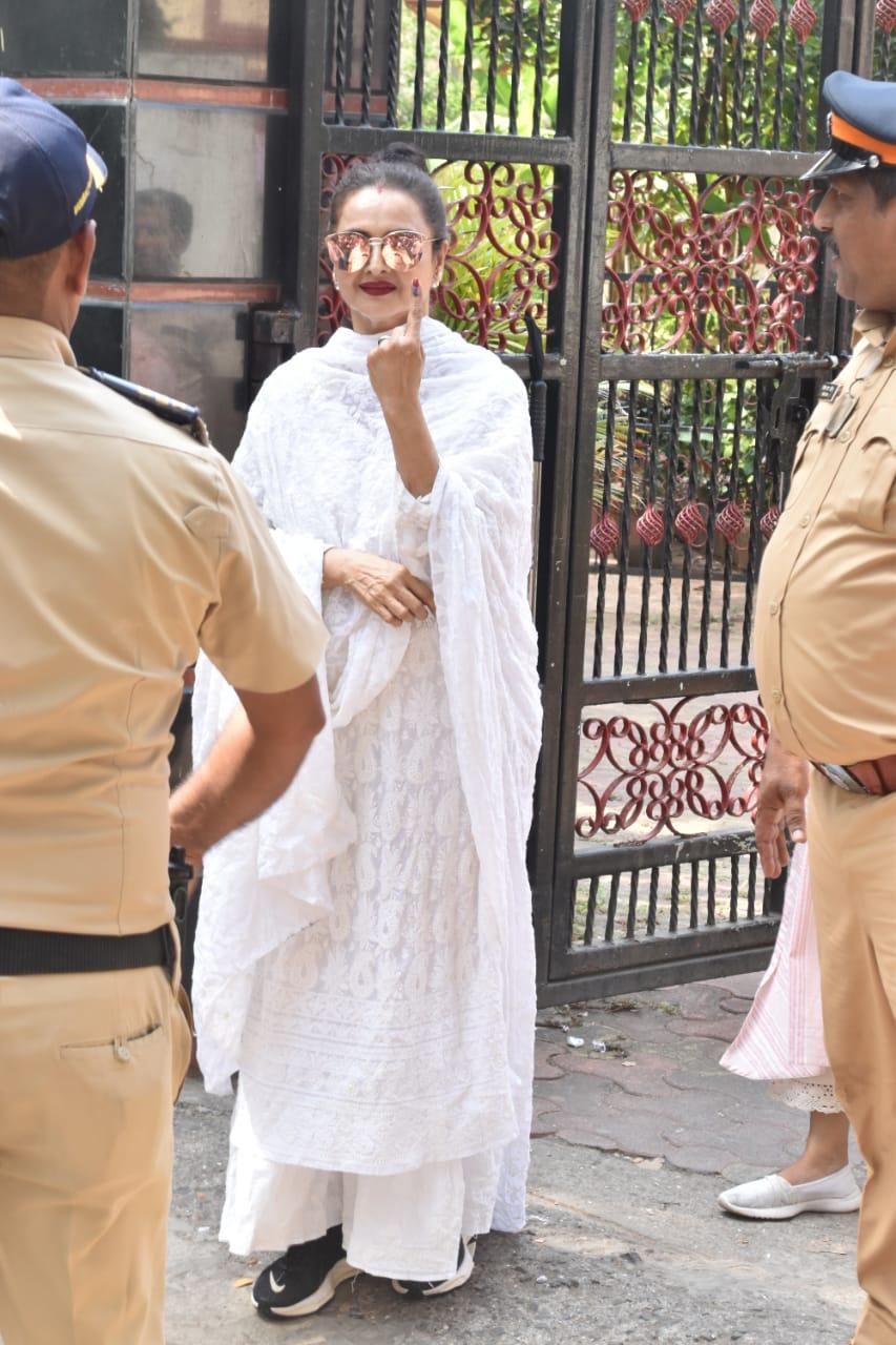Rekha was clicked in an all-white suit as she went to cast her vote