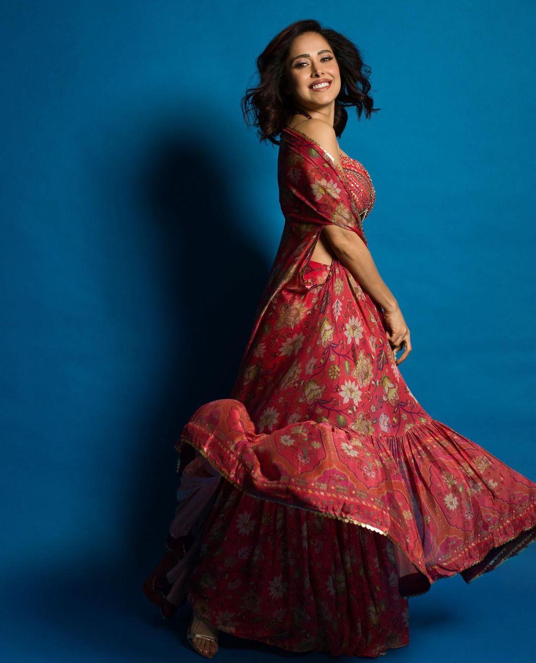 She further elevated her look by styling her hair in soft curls. She applied minimal makeup and wore stylish jewellery pieces to enhance her appearance