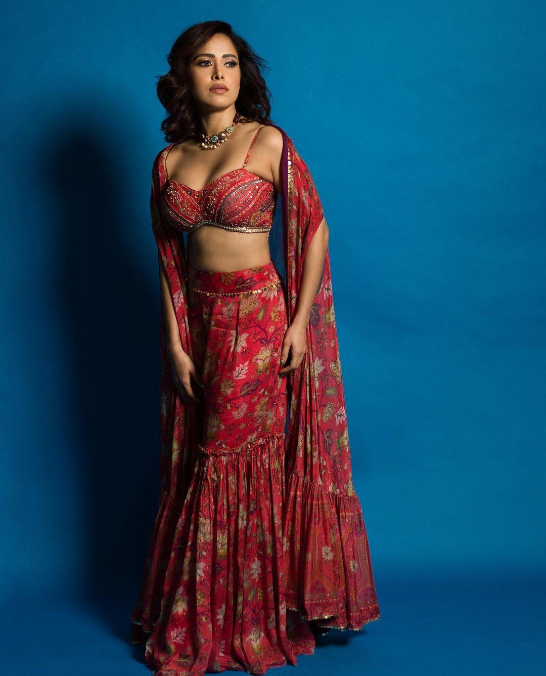 We can't ignore weddings just because it's summer, but wearing heavy outfits is not ideal. So take inspiration from Nushrratt’s look