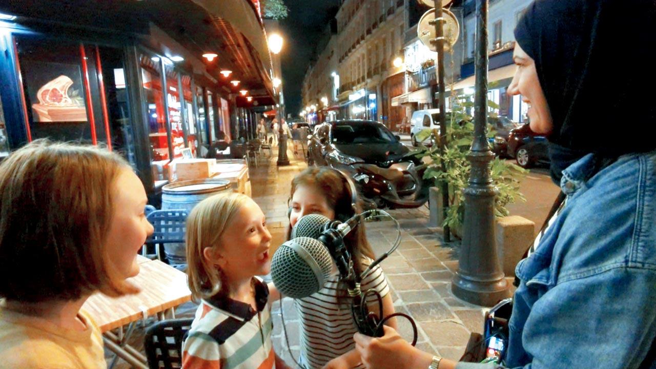 The team records at the L’ As du Fallafel restaurant