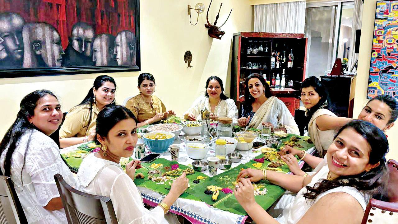 The women indulge in a sadya-style meal