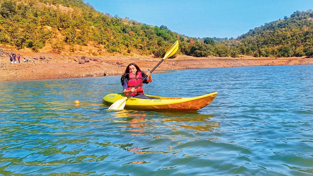 A participant engages in kayaking in Igatpuri