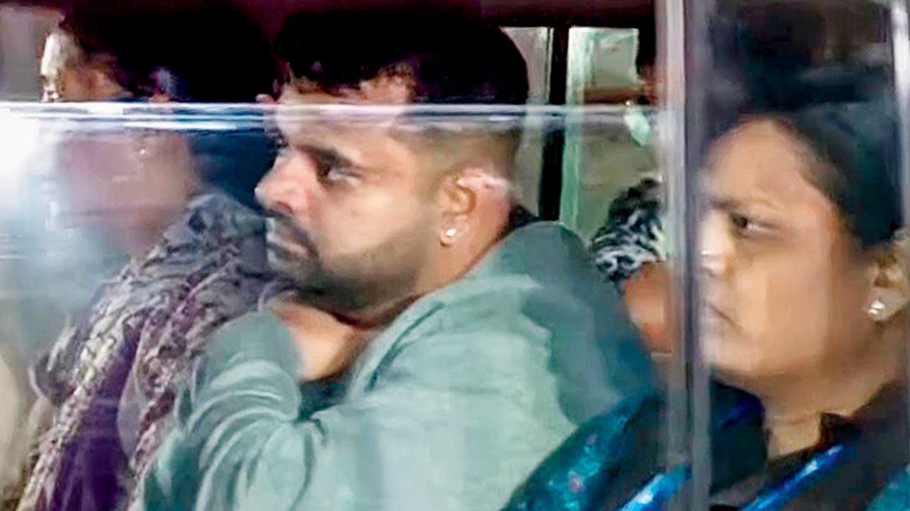 Prajwal Revanna being brought to the CID office. Pic/PTI 