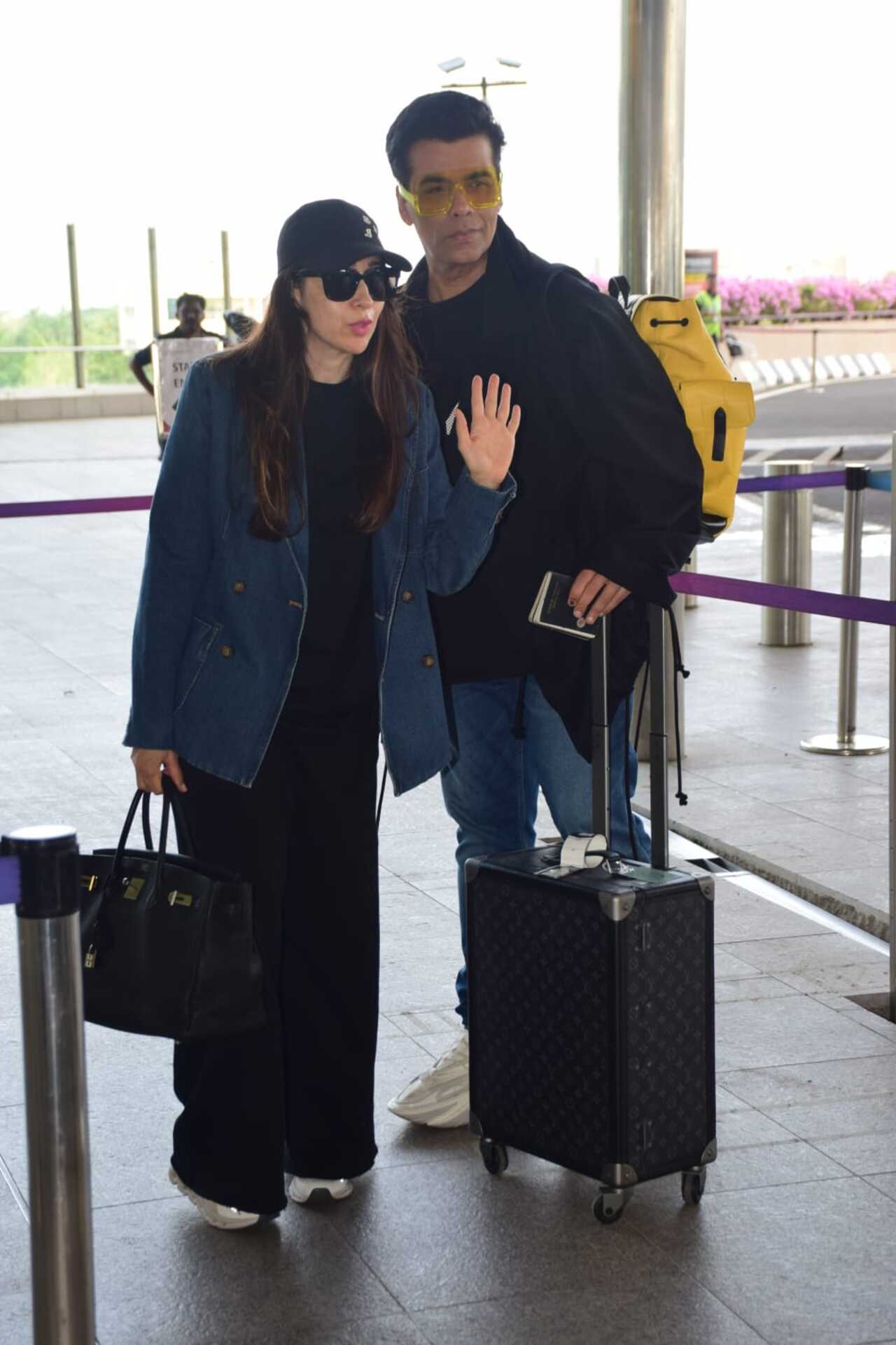 Kareena's sister Karisma Kapoor tagged along with filmmaker and Dharma honcho Karan Johar as they color-coordinated their outfits. 