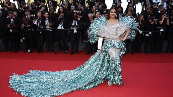 Aishwarya Rai Bachchan made her second appearance on the red carpet on Friday. The actress chose a striking ensemble—a silver outfit with turquoise accents—from the collection of Falguni Shane Peacock. (Pic/AFP)