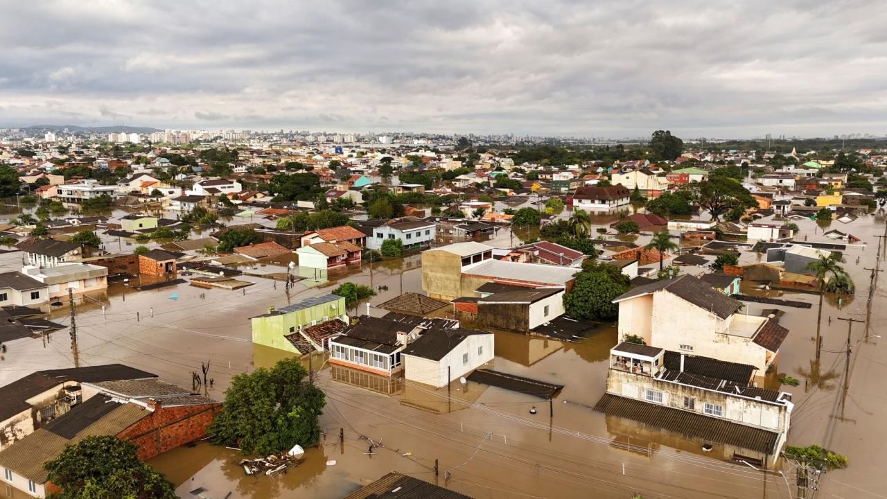 In the town of Feliz, 50 miles (80 kilometers) from the state capital, Porto Alegre, a massively swollen river swept away a bridge that connected it with the neighbouring city of Linha Nova