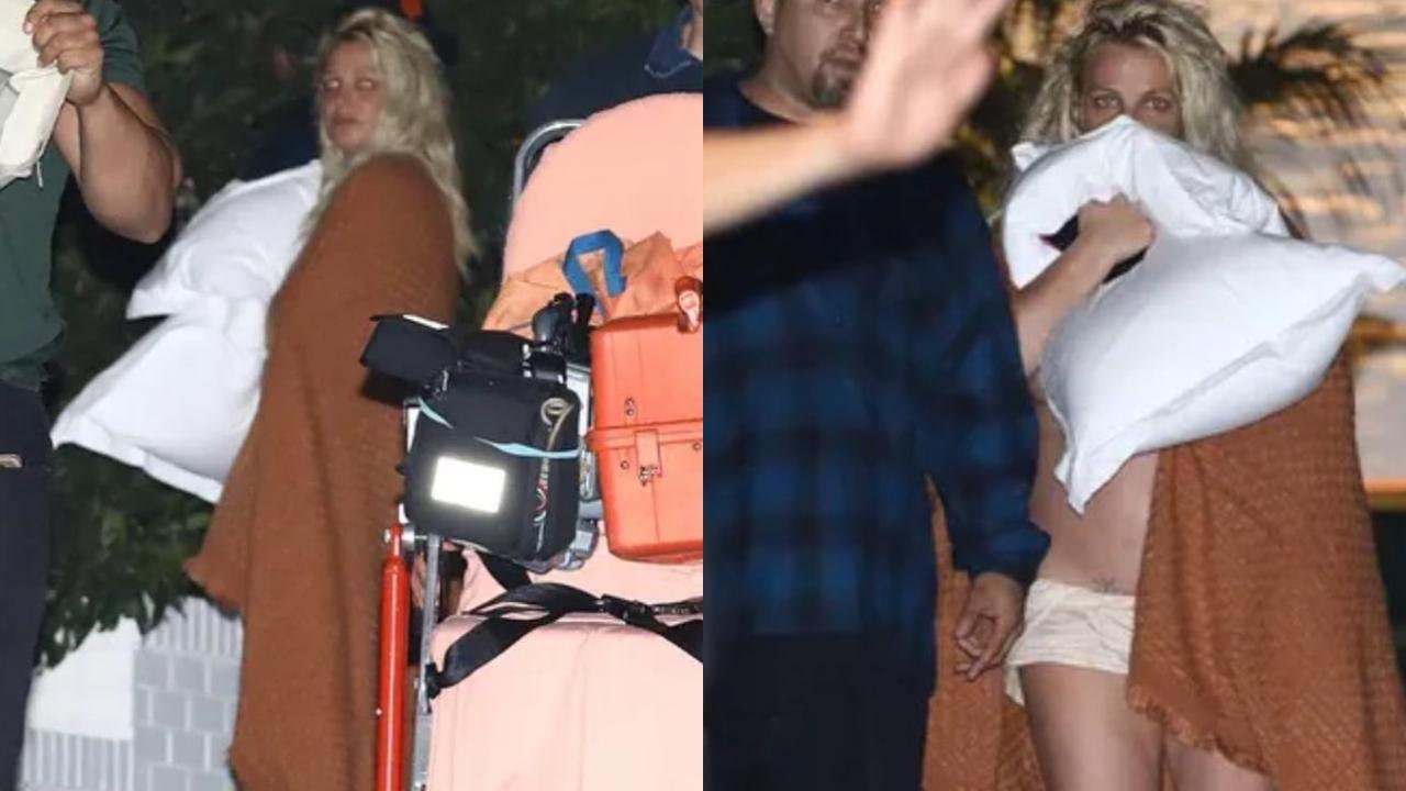 Britney Spears walks out of hotel topless after reported altercation with Paul