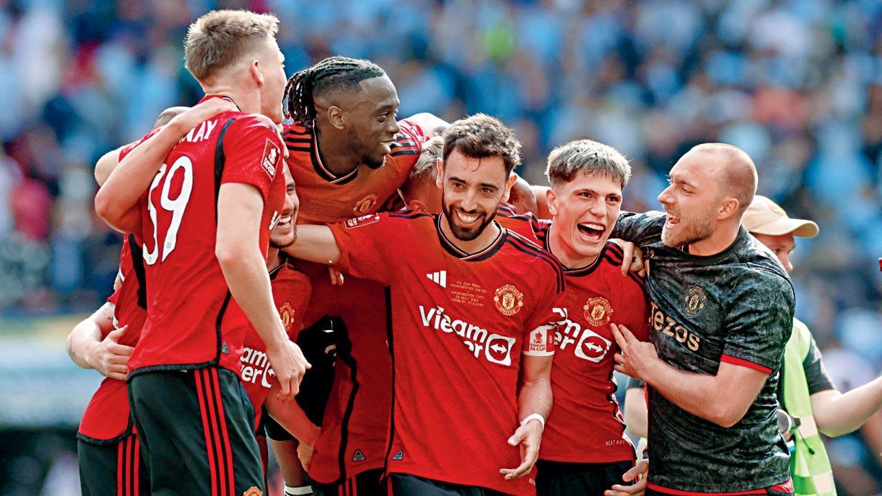 Manchester Utd stun league champs City 2-1 to lift FA Cup