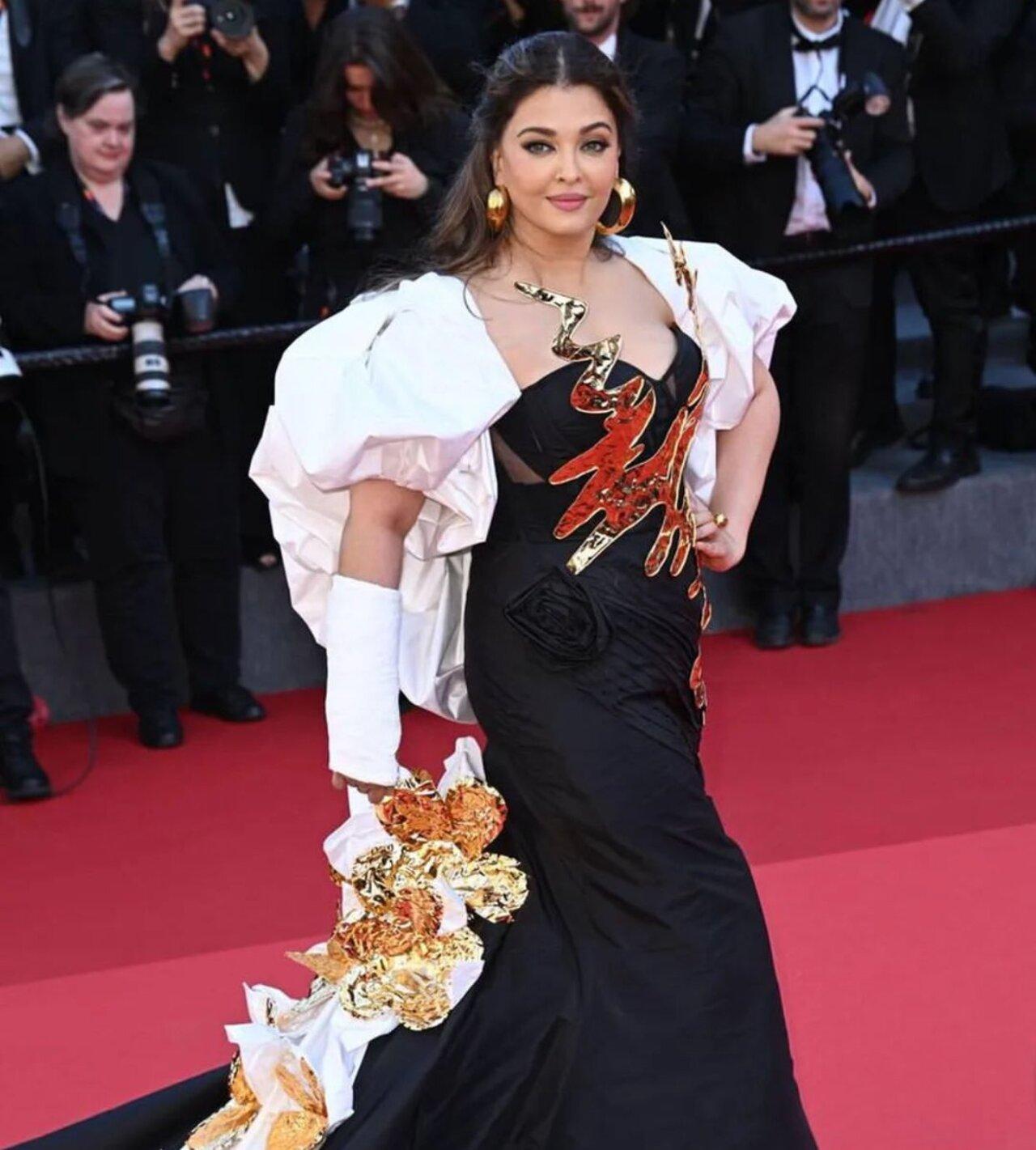 A regular attendee of the prestigious event, Aishwarya Rai Bachchan attended the 'Megalopolis' red carpet in a breathtaking black and gold ensemble that epitomised glamour and sophistication