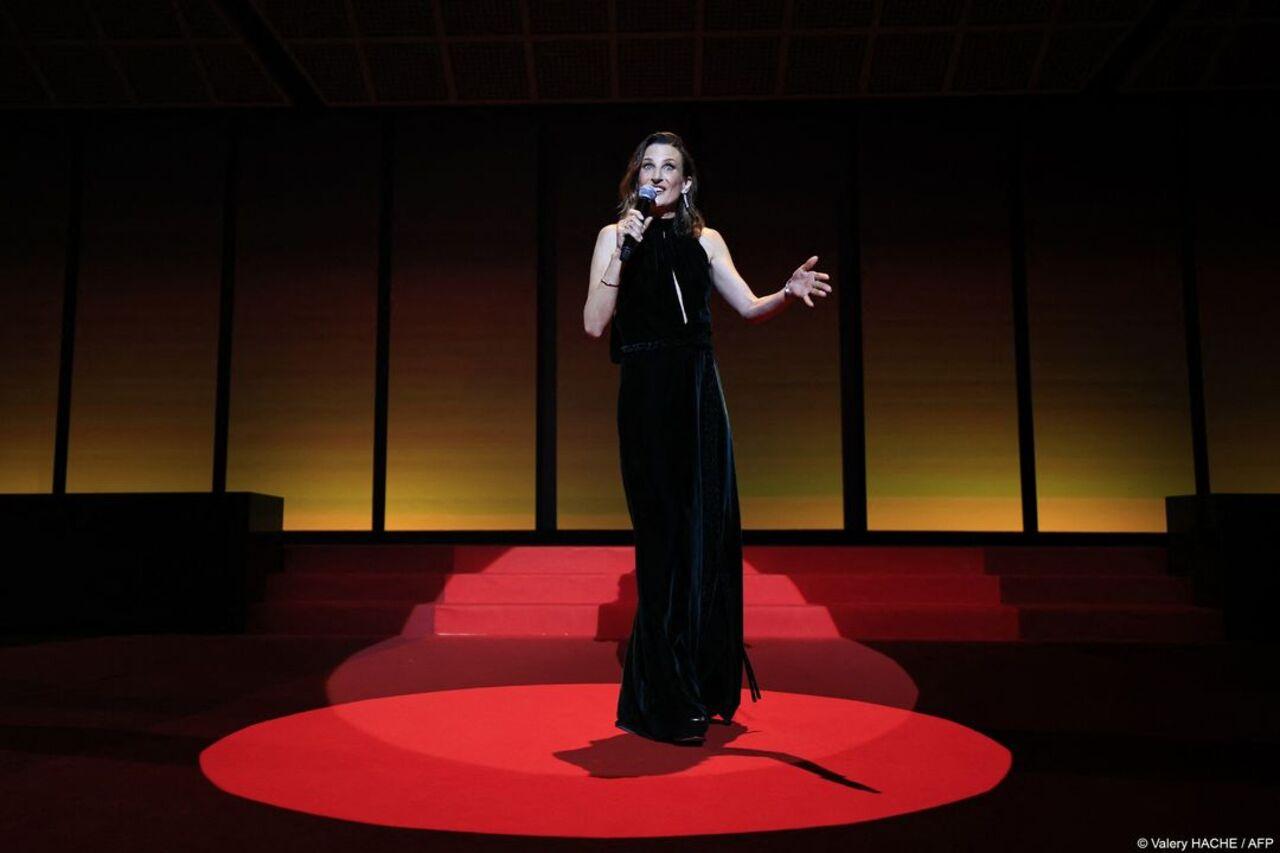 French actress and master of the ceremony of the 77th cannes film festival Camille Cottin delivers a speech on stage during the Opening Ceremony and the screening of the film 