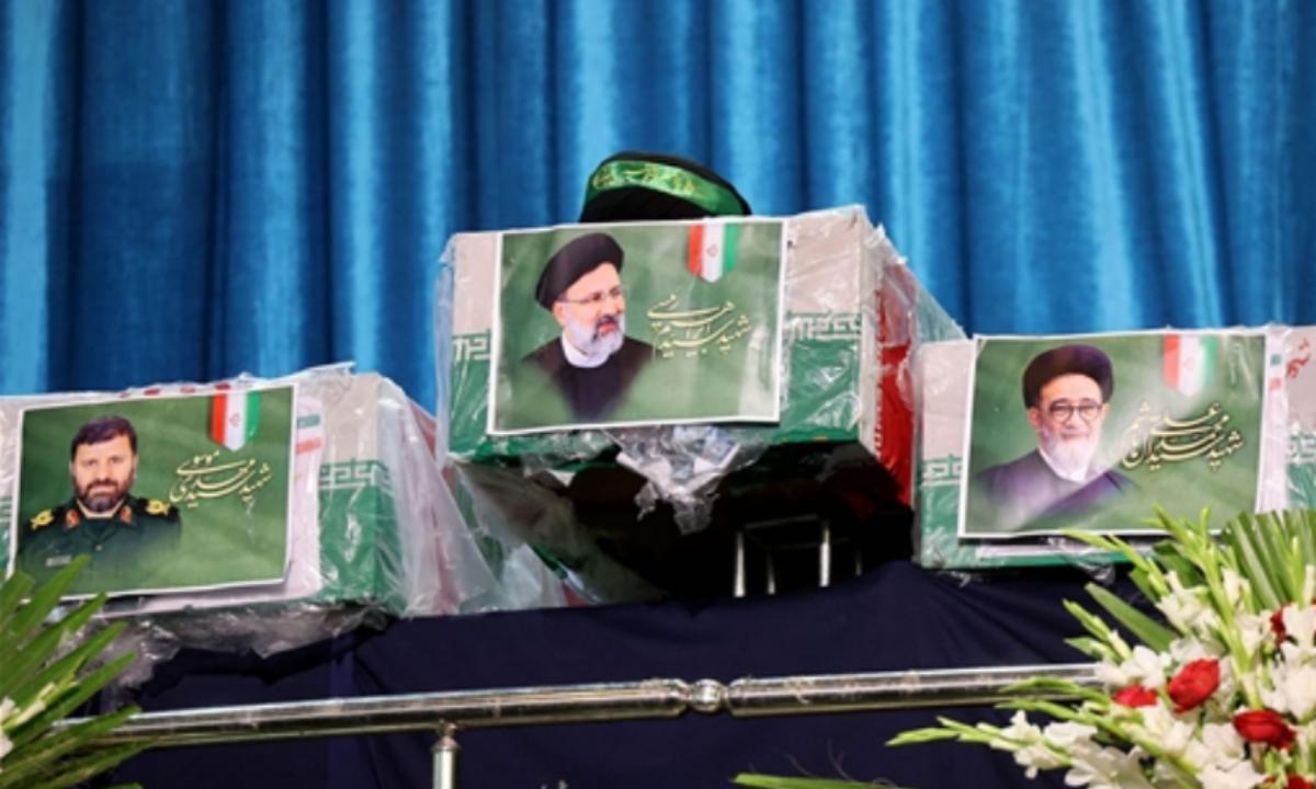 The caskets of the dead were draped in Iranian flags with their pictures on them. On the late President Ebrahim Raisi's coffin sat a black turban signifying his direct descendance from Islam's Prophet Muhammad.