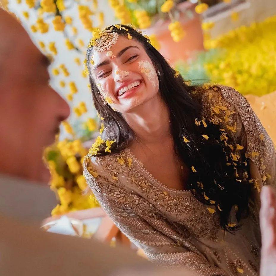 In one picture, Athiya Shetty was pictured smiling ear to ear with Haldi on her face.