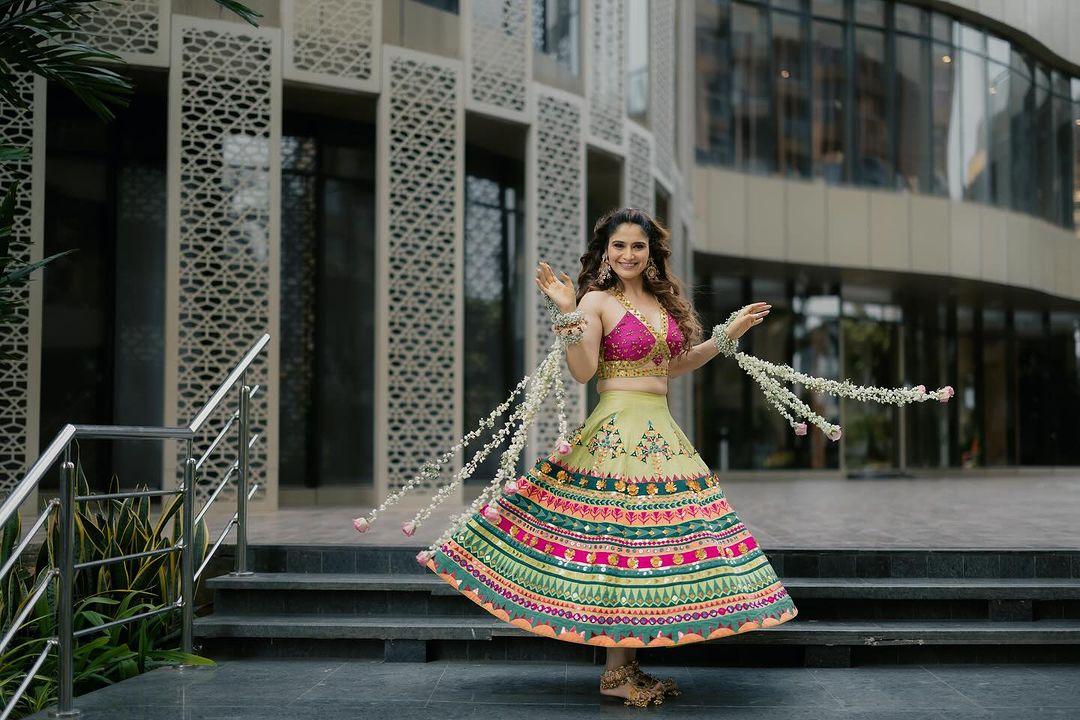 Completing her look were flower kaleeras and oversized kundan earrings. Meanwhile, the groom-to-be looked dashing in an embroidered traditional outfit.