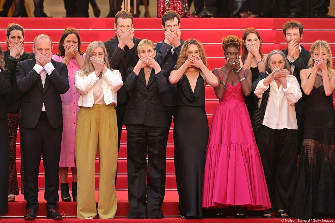 French actress and screenwriter Judith Godreche, French actress Tess Barthelemy, French journalist Rokhaya Diallo and others gestures as they arrive for the screening of the film 