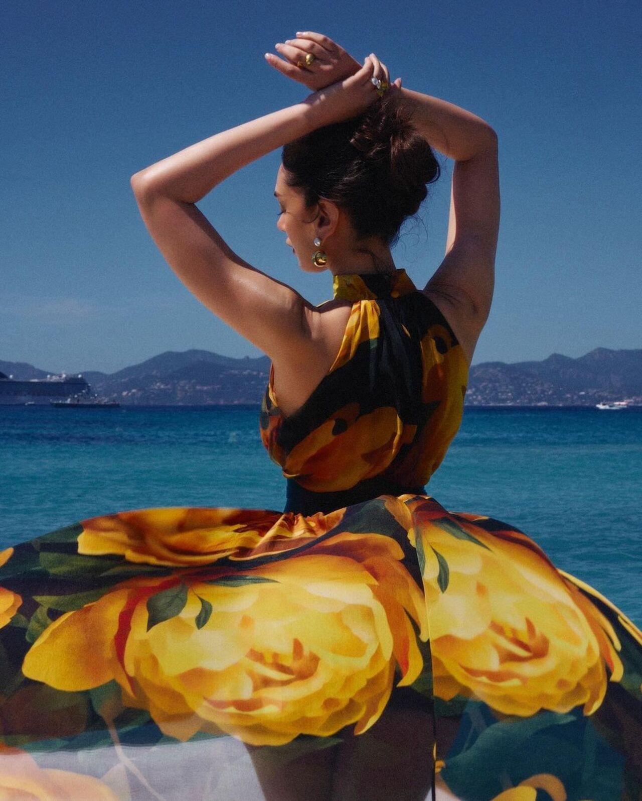 Aditi Rao Hydari took to her Instagram and shared pics posing near the sea in a floral dress picked from the shelves of the clothing brand Gauri & Nainika. The actress gave princess vibes in the yellow and black short dress