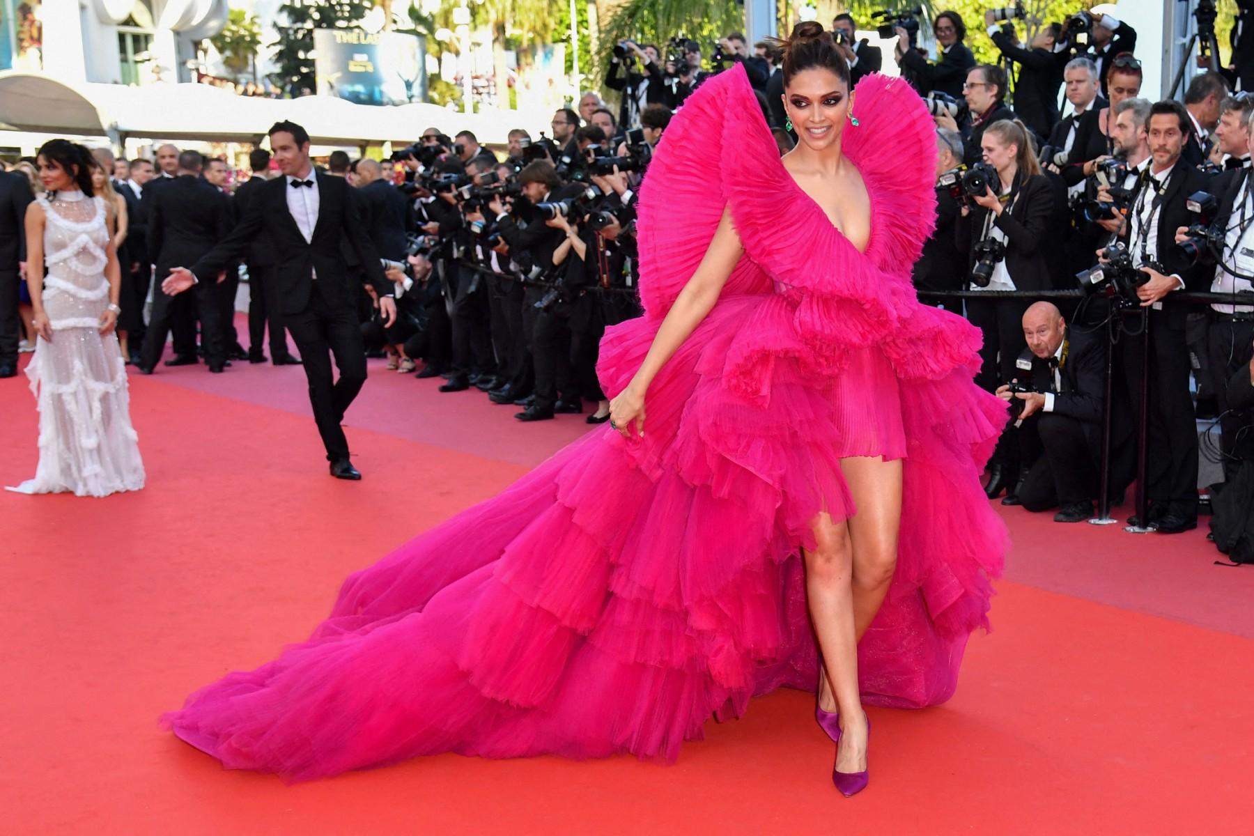 Deepika Padukone's last look at the 2018 Cannes Film Festival was in a stunning hot pink gown by Ashi Studio. She chose a unique origami-style gown from Ashi Studio's Summer/Spring 2018 Collection.