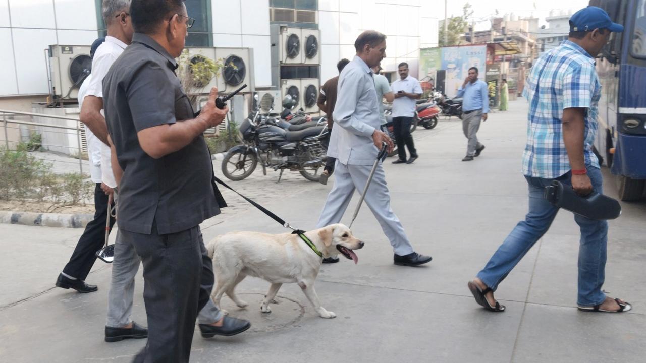 Security officials at Burari Hospital in Delhi after it received bomb threat via e-mail. Pics/PTI