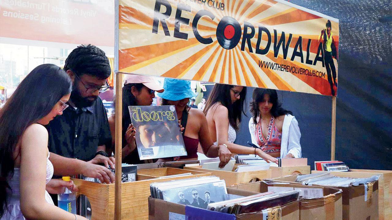 Shoppers browse for records from the collection at the event