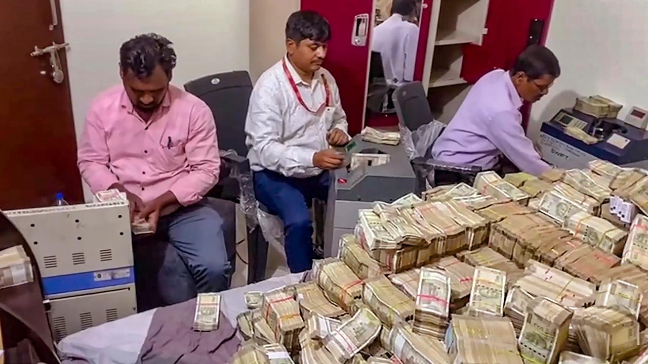 IN PHOTOS: ED seizes huge cash, arrests Jharkhand minister's aides after raids