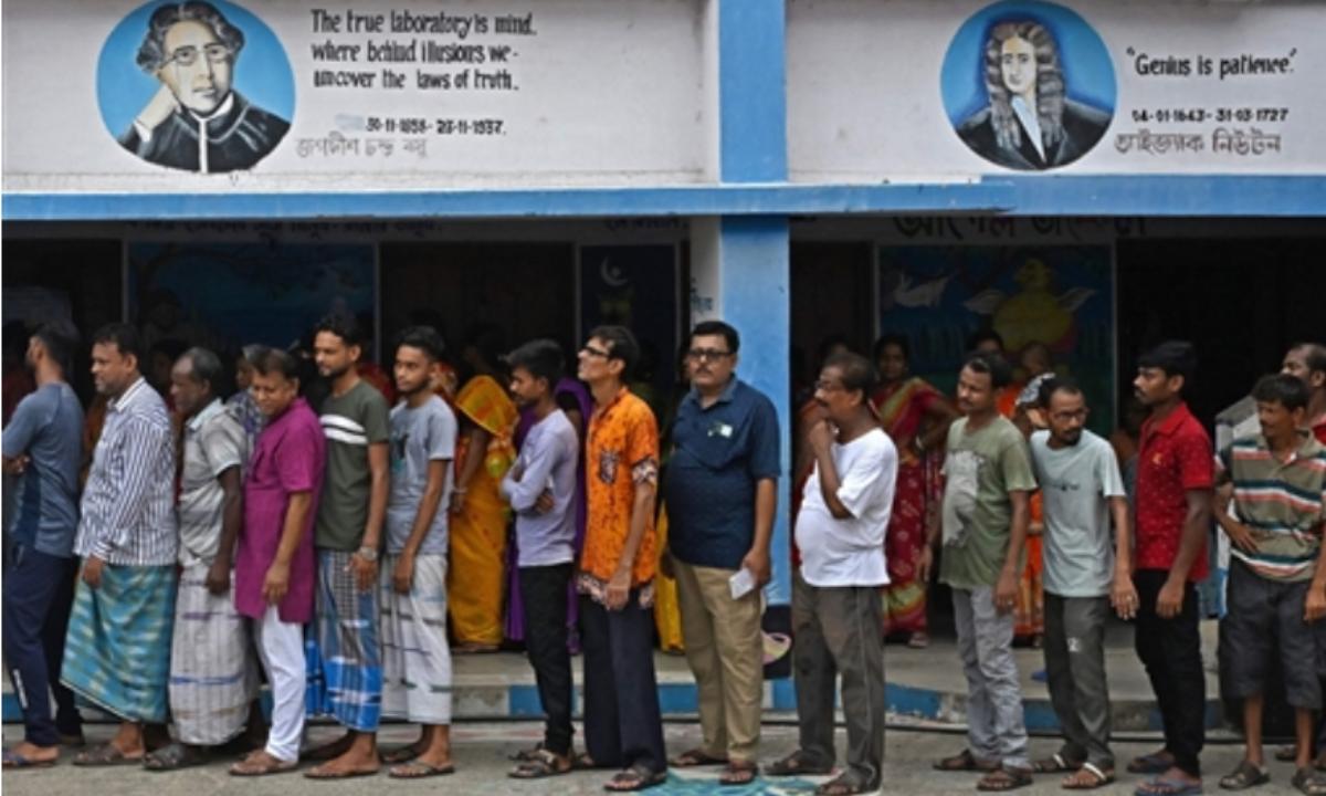 Men and women voters assemble in a school in Uluberiya, West Bengal to cast their vote. 7 constituencies from West Bengal go to ballot in the fifth phase of General Elections 2024.