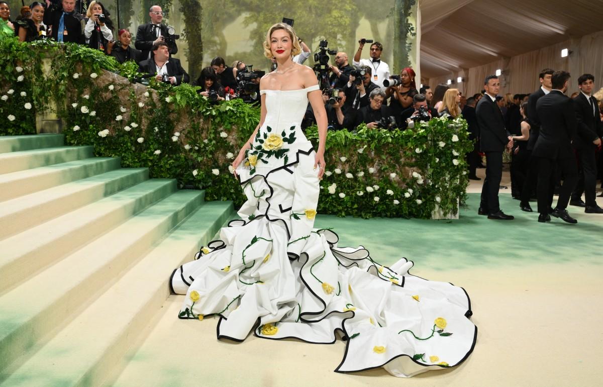 Gigi Hadid opted for a retro vibe at the 2024 Met Gala. She looked stunning in a floral white tiered dress.