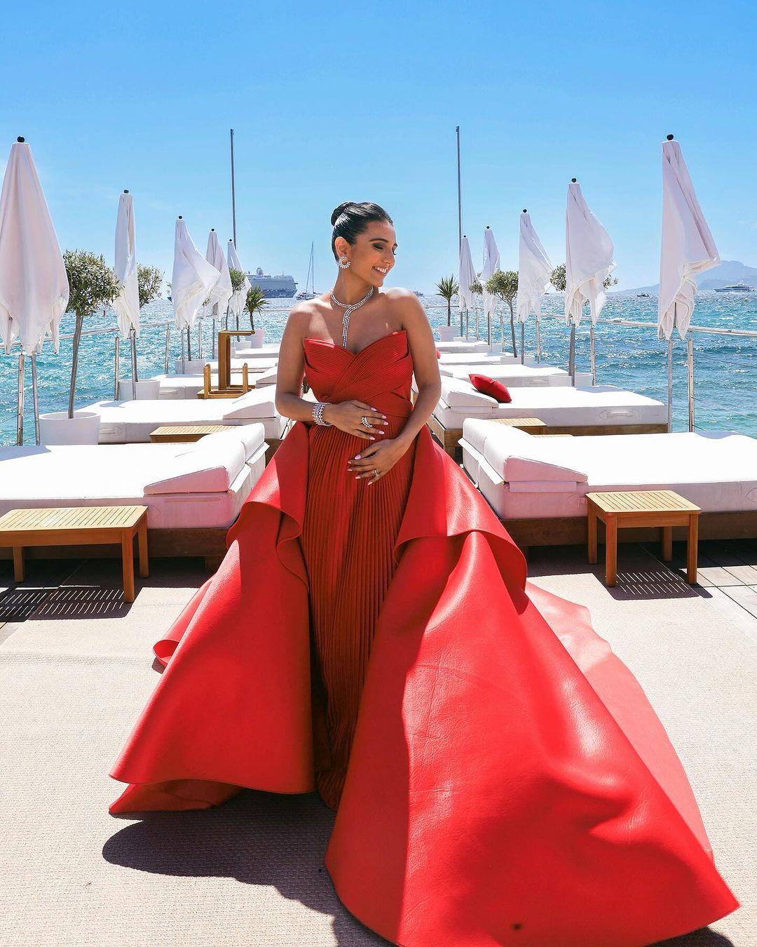 Masoom Minawala stunned in a custom scarlet gown by ace designer Amit Aggarwal as he drew inspiration from the beauty of architecture and the organic elements of nature. 