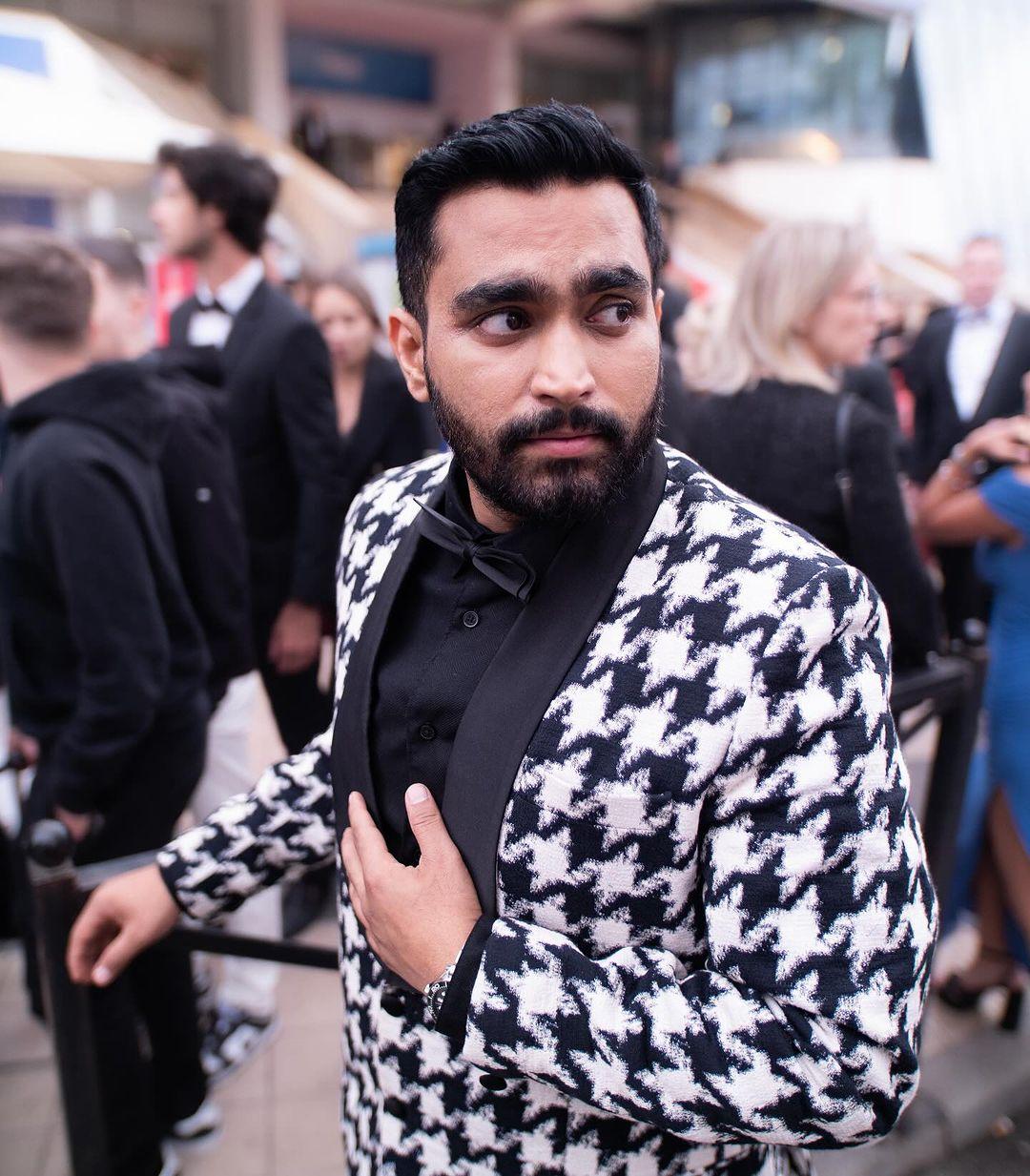 Viraj's outfit, styled by the talented Saloni Parekh, was both fashionable and eye-catching. The intricate patterns on his jacket highlighted his impeccable style, complemented by a stylish black bow tie and a sleek black shirt.