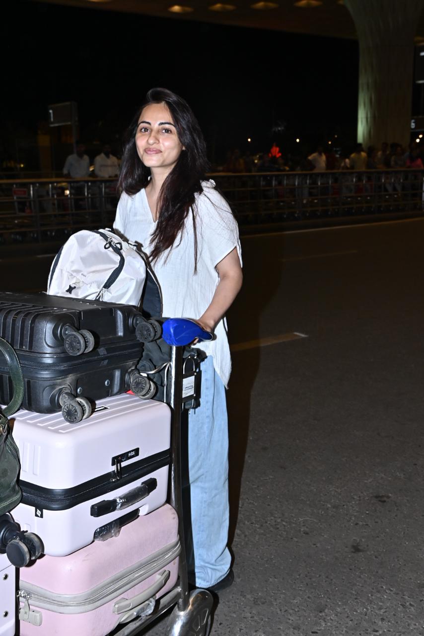 Niyati Fatnani opted for white T-shirt and blue jeans for her airport look