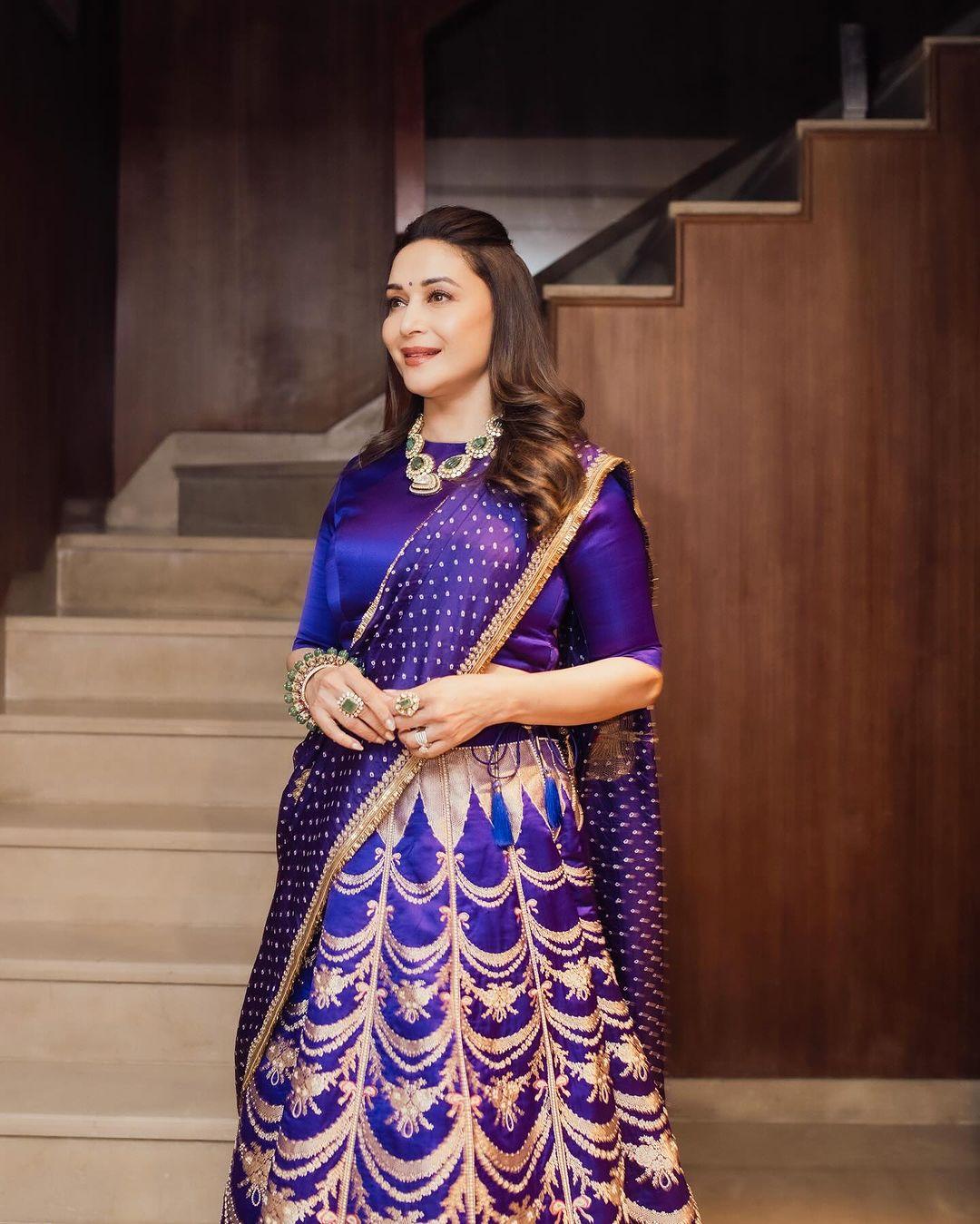The colour suited her well, and the intricate designs on the skirt added a timeless touch to the ensemble