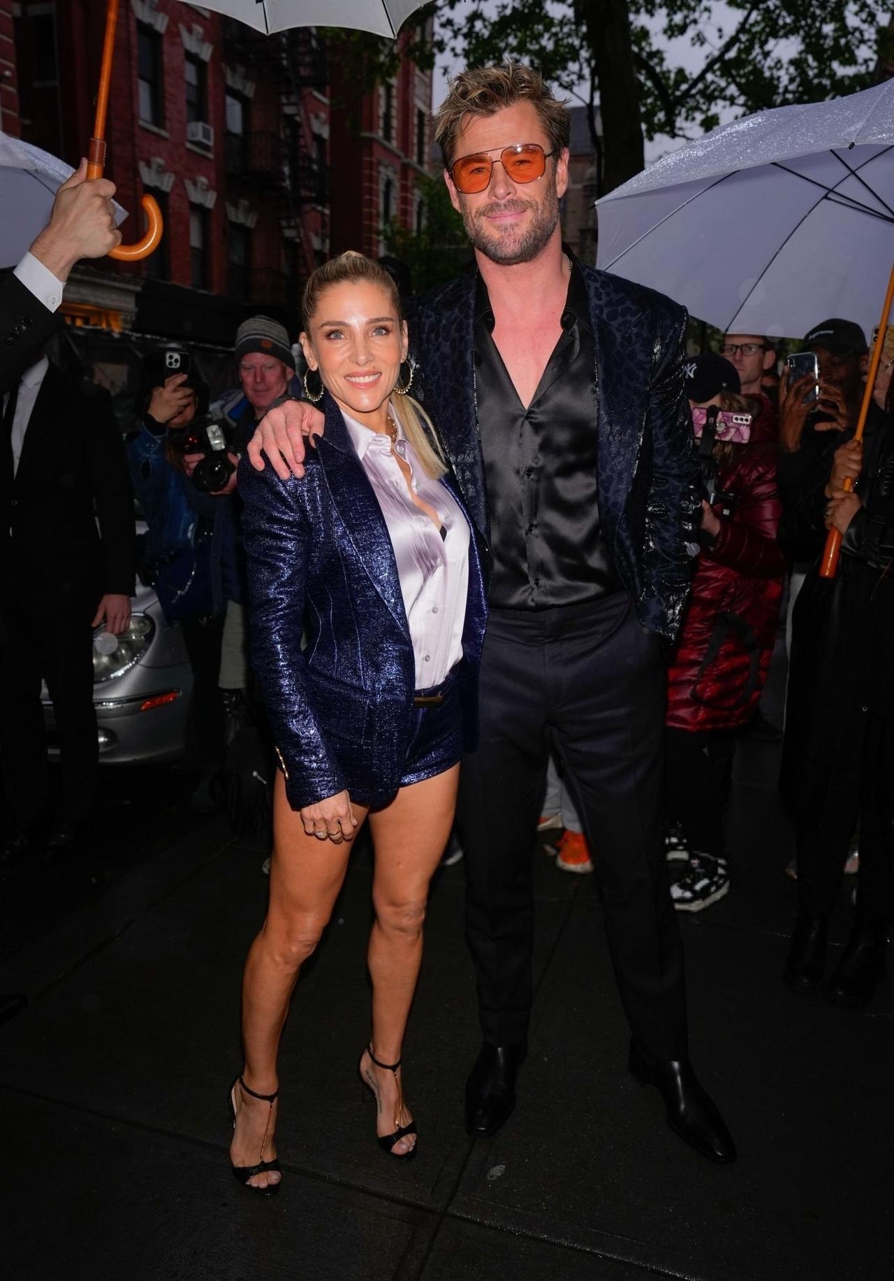 Actor Chris Hemsworth looked dapper in an animal-print blazer paired with a black satin shirt and accessorised it with orange-tinted sunglasses. His wife Elsa Pataky wore a blue sequinned co-ord set. 