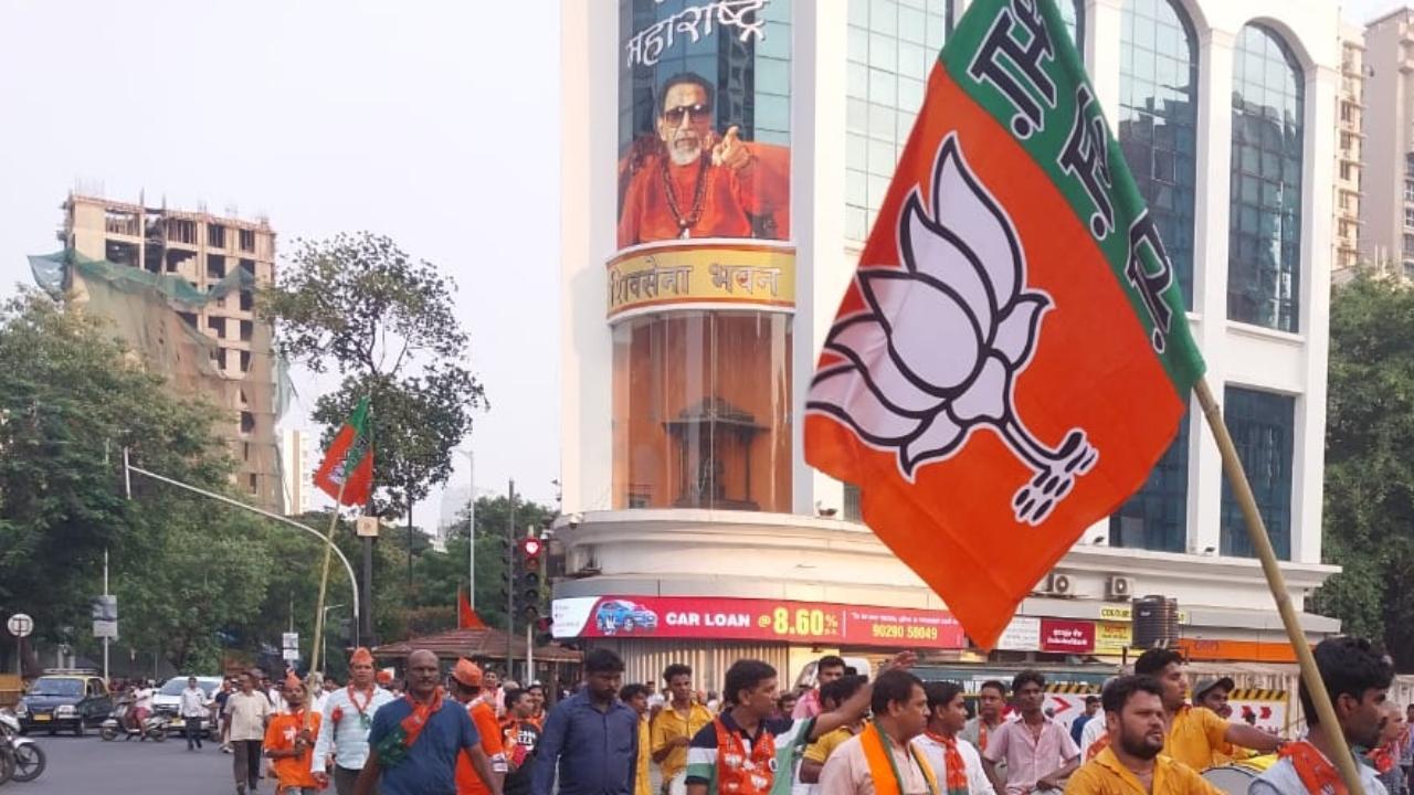 IN PHOTOS: Mahayuti supporters walk by Shiv Sena bhavan to reach Shivaji Park