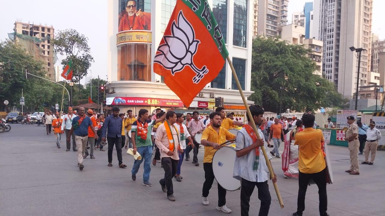 Maharashtra CM Eknath Shinde, Devendra Fadnavis were seen attending PM Modi's roadshow in Ghatkopar on Wednesday