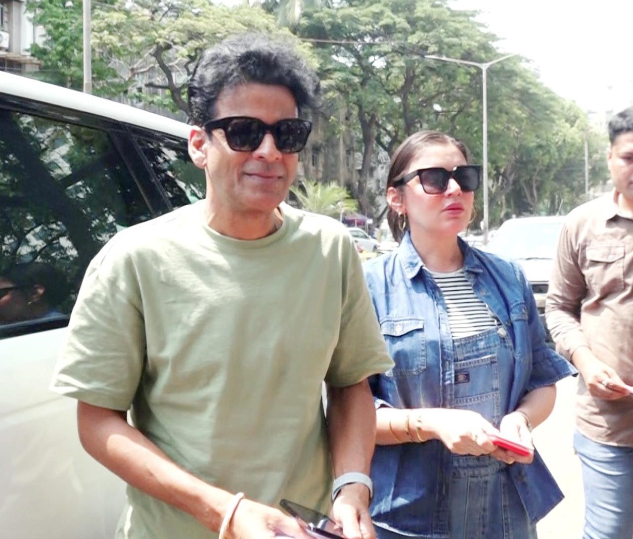 Manoj Bajpayee and his wife at a polling booth in Mumbai