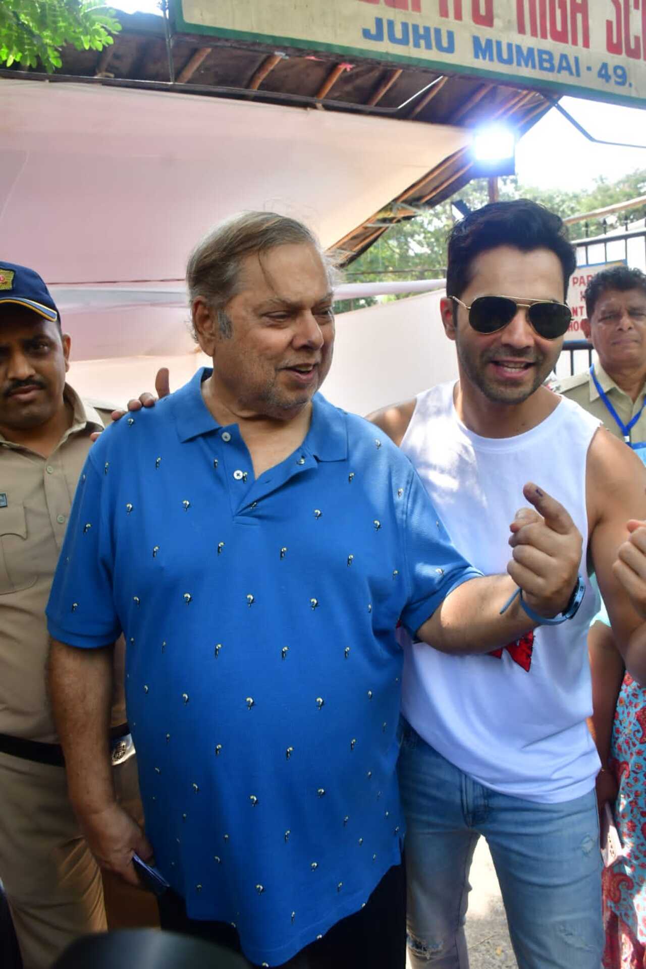 David Dhawan and actor Varun Dhawan arrived together to cast their vote
