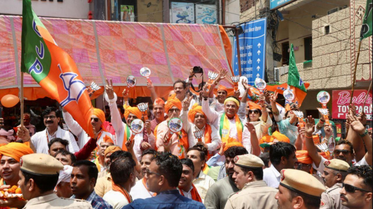 Arvind Sharma, the sitting MP and BJP candidate from Rohtak Lok Sabha seat, was present at the rally, emphasising the importance of local representation in the electoral process.
